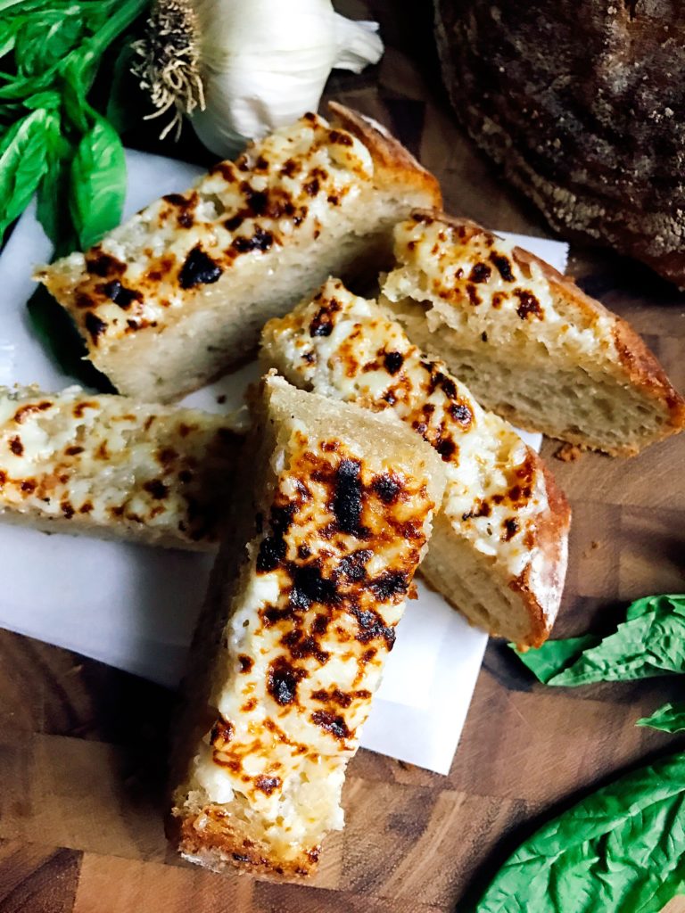 A fast and easy vegetarian side dish for Italian dinners. Ready in less than 10 minutes, this Sourdough Garlic Bread is kid friendly and packed full of flavor. 