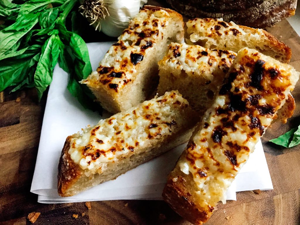 A fast and easy vegetarian side dish for Italian dinners. Ready in less than 10 minutes, this Sourdough Garlic Bread is kid friendly and packed full of flavor. 