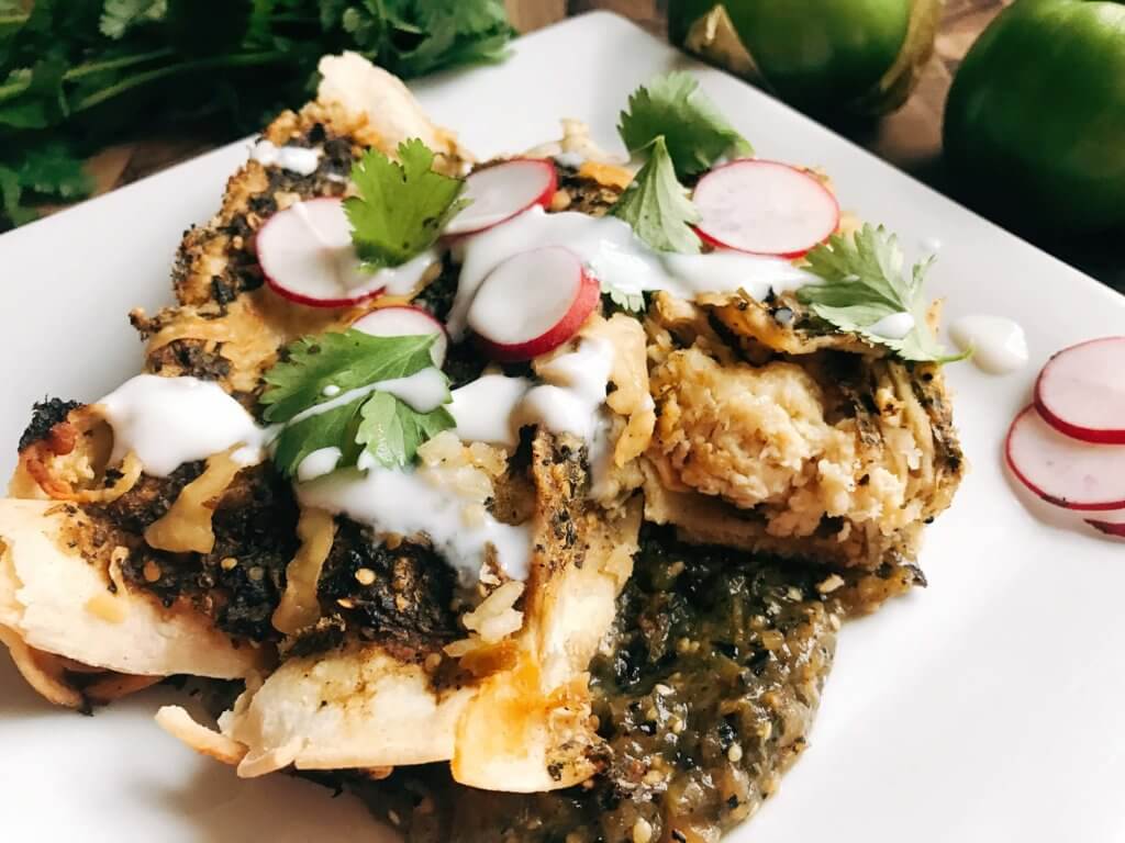 Roasted Poblano Salsa Verde Green Enchiladas with Chicken on a white plate