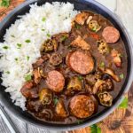 Top view of Authentic Chicken and Smoked Sausage Gumbo in a gray bowl with rice