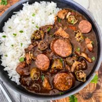 Top view of Authentic Chicken and Smoked Sausage Gumbo in a gray bowl with rice