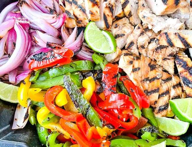 Citrus Chicken Fajitas on the Grill all cut up and placed in a skillet