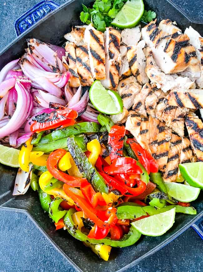 Citrus Chicken Fajitas on the Grill all cut up and placed in a skillet