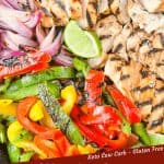 Pin image of Citrus Chicken Fajitas on the Grill close up and cut up ready to eat