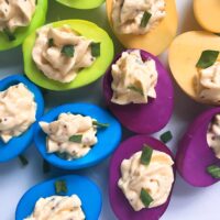 A pile of brightly Colored Deviled Eggs