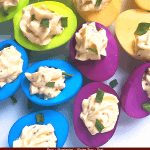 Pin of Colored Deviled Eggs in a pile with title