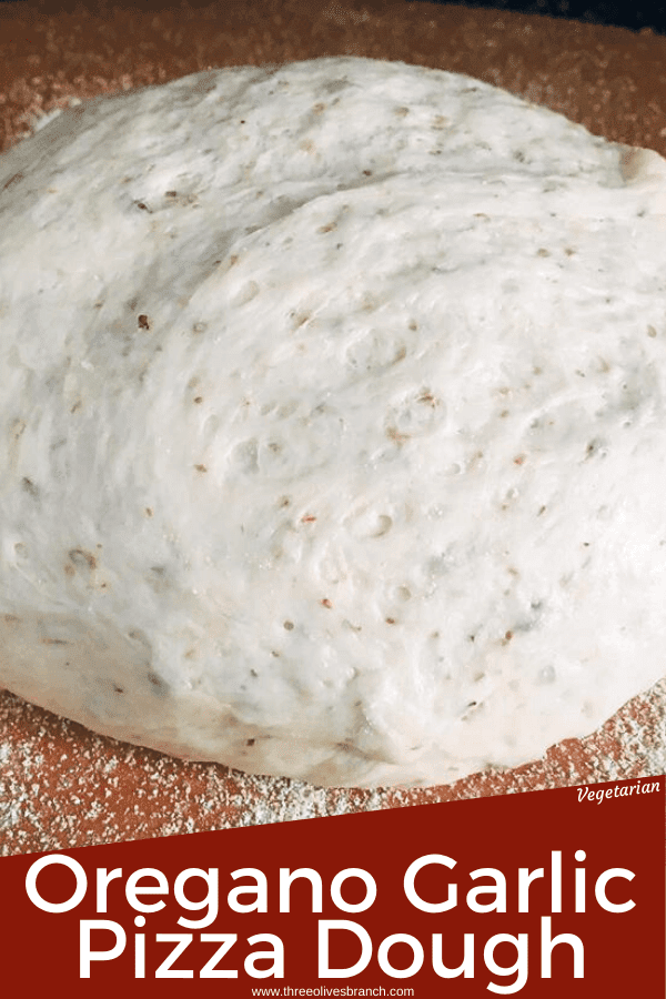 Italian Oregano Garlic Pizza Dough is a simple homemade pizza dough perfect for any toppings! Easy homemade pizza night. #pizza #pizzadough #homemadepizza