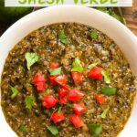 Pin of Roasted Tomatillo Salsa Verde in a white bowl with tomatoes and cilantro as a garnish. Title at top