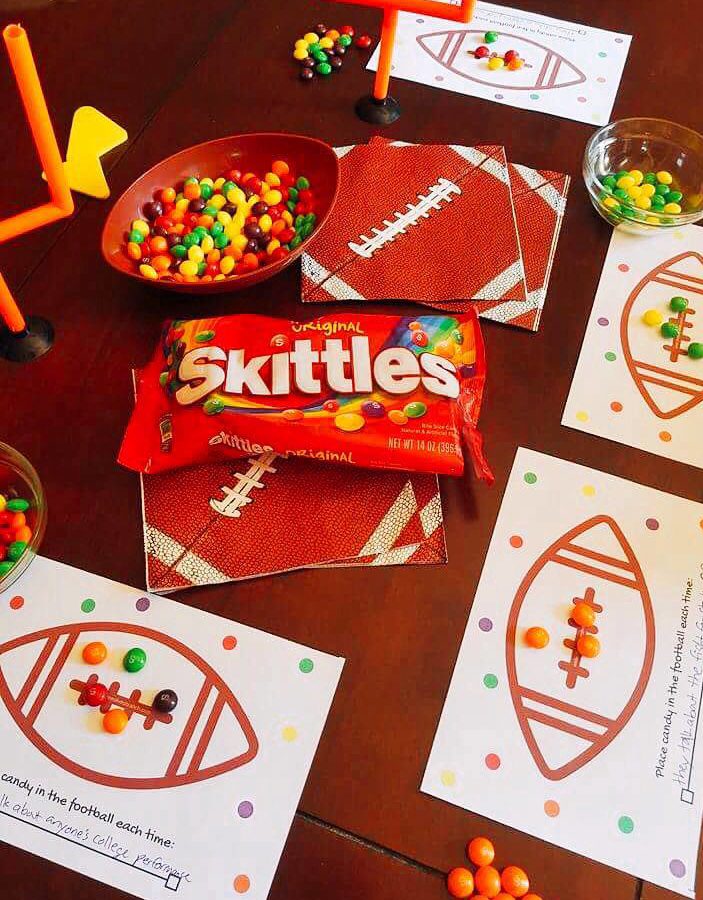 A fun homegating football game! Pick a phrase or event during the game to keep track of with @Skittles as your playing pieces and see who wins! FREE Printable on site! #ad #CallAnEatible #SkittlesHomegating