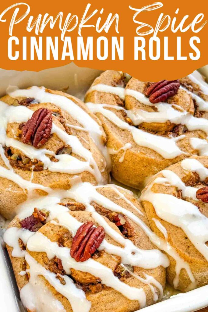 Pin of Pumpkin Spice Cinnamon Rolls with Maple Cream Cheese Glaze in a baking dish with title.