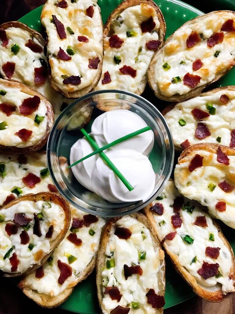 Perfect for the big game, these Jalapeno Popper Potato Skins are one of our favorites! Control the spicy heat level with the amount of jalapeno you use and this is perfect as an appetizer, especially for football games! Easy to make and vegetarian friendly. Three Olives Branch | www.threeolivesbranch.com 