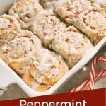 Pin image for a white tray full of Peppermint White Chocolate Sweet Rolls (Cinnamon Rolls) surrounded by candy canes with title at bottom