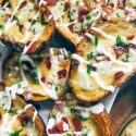 A pile of Bacon and Bourbon Blue Cheese Potato Skins