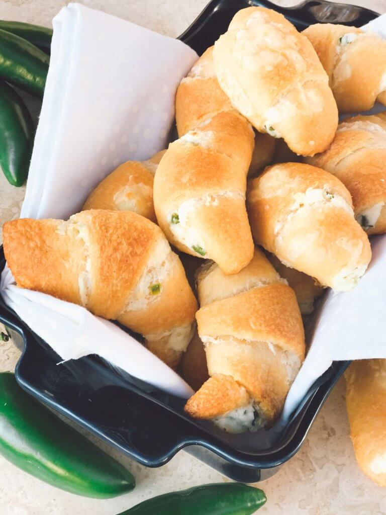 Jalapeno Popper Crescent Rolls stacked in a basket