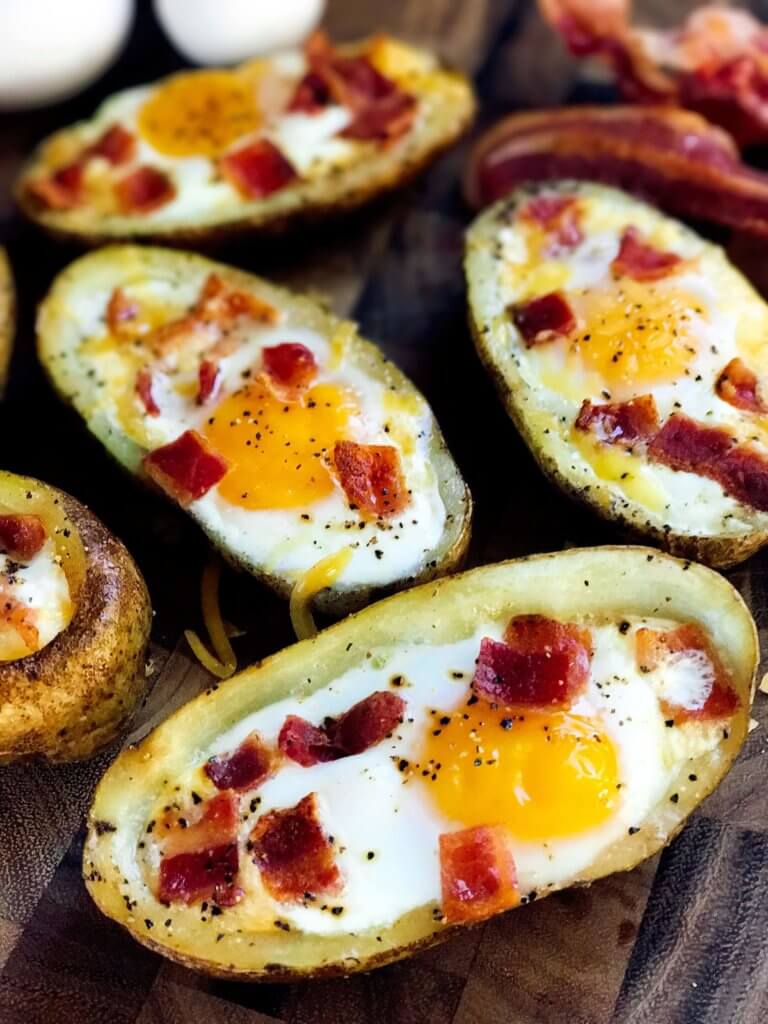 Make in advance for a fun appetizer, snack, breakfast, brunch, or lunch! A twist on some classics, kid friendly and perfect for the big game or Super Bowl! A party favorite. Bacon and Eggs Potato Skins | Three Olives Branch | www.threeolivesbranch.com