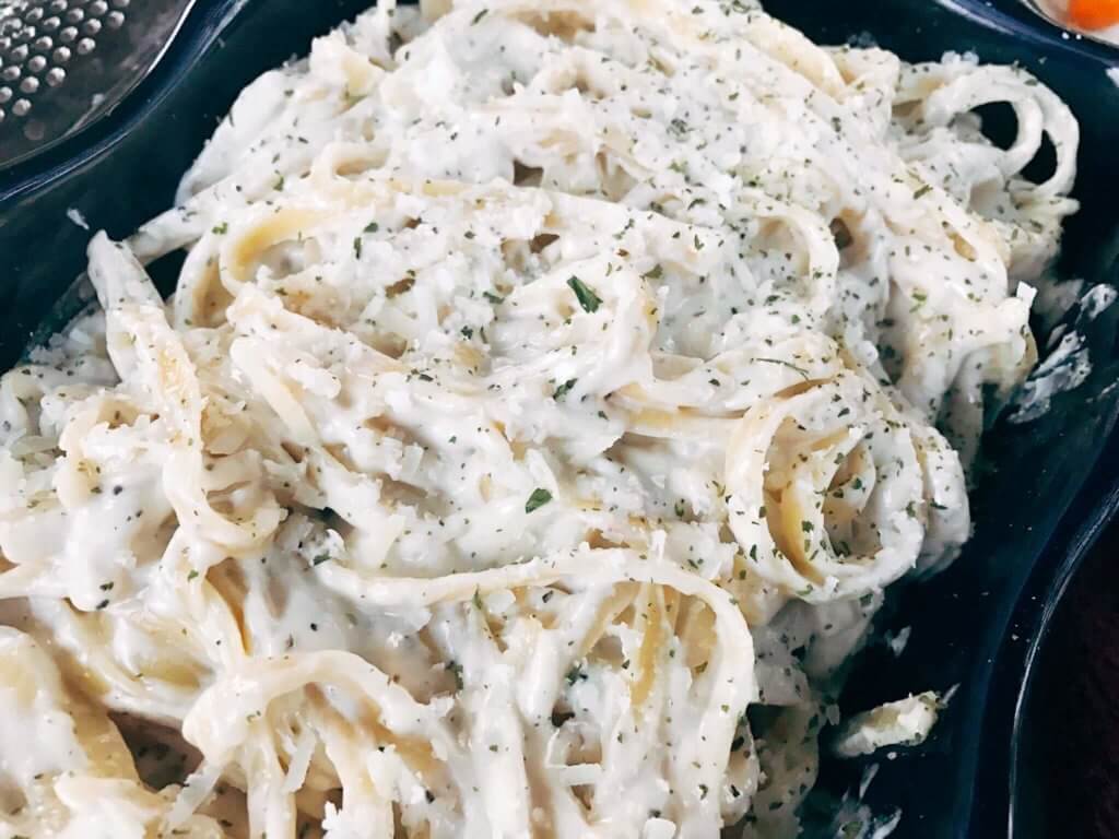 Copycat Olive Garden Fettuccine Alfredo in a blue dish