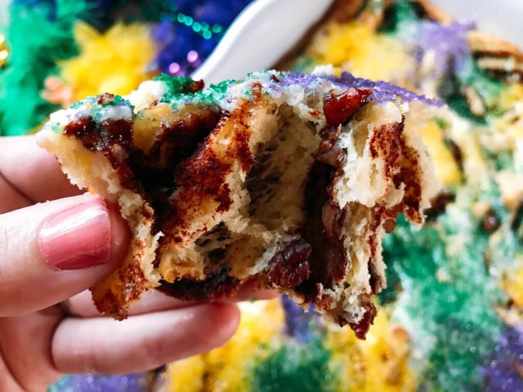 Make in advance for an easy breakfast! Comfort food perfect for the holiday. Vegetarian and kid friendly. Pecan, cinnamon, and flaky dough. Mardi Gras King Cake Cinnamon Rolls | Three Olives Branch | www.threeolivesbranch.com