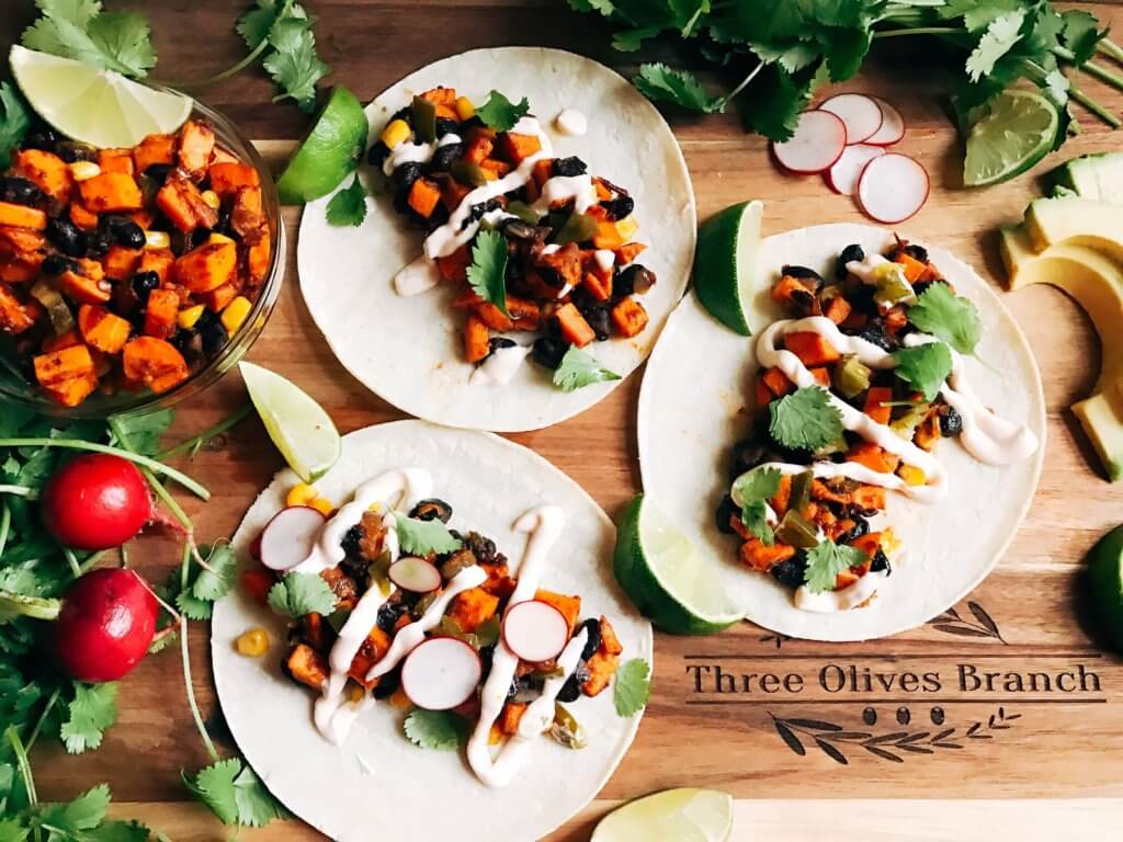 Less than 30 minutes for vegetarian and vegan tacos! Perfect for busy nights. Fast, simple, healthy, and fresh. Great for Lent, Taco Tuesday, Meatless Monday, and more. Southwest Chipotle Sweet Potato Tacos | Three Olives Branch | www.threeolivesbranch.com