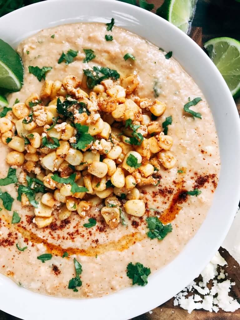 Ready in less than 10 minutes, this hummus is perfect for entertaining! Serve it up as an appetizer or snack, perfect for Mexican parties, fiestas, and Cinco de Mayo. Corn, lime, cotija cheese, and chili powder are the star here, using the same flavors of a traditional Elote (Mexican Street Corn) in a healthy and fresh dip. Vegetarian and vegan friendly, fast, simple, and healthy. Mexican Street Corn Hummus | Three Olives Branch | www.threeolivesbranch.com