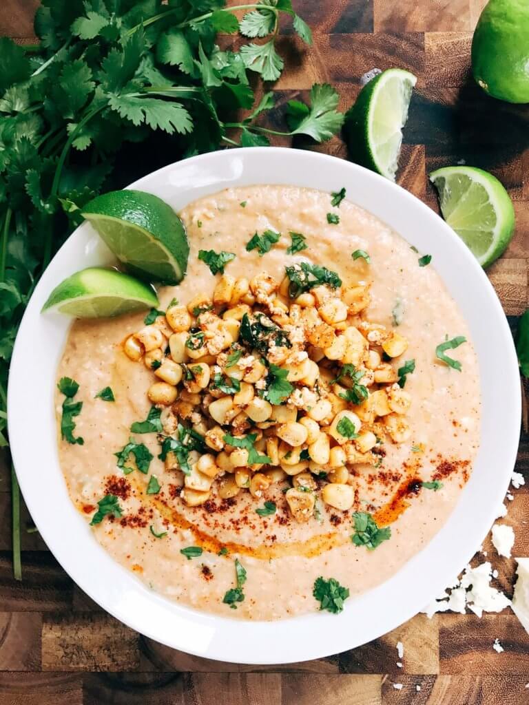 Ready in less than 10 minutes, this hummus is perfect for entertaining! Serve it up as an appetizer or snack, perfect for Mexican parties, fiestas, and Cinco de Mayo. Corn, lime, cotija cheese, and chili powder are the star here, using the same flavors of a traditional Elote (Mexican Street Corn) in a healthy and fresh dip. Vegetarian and vegan friendly, fast, simple, and healthy. Mexican Street Corn Hummus | Three Olives Branch | www.threeolivesbranch.com