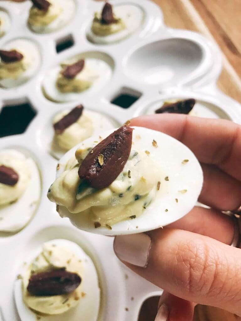 Ready in 10 minutes, these eggs are a perfect appetizer or snack for holidays like Easter and gatherings. Serve up a classic dish with a twist at your party, game day, or event. Quick and simple to make. Vegetarian. Cucumber, dill, garlic, and lemon shine in these deviled eggs to bring the same flavors of a Greek yogurt tzatziki sauce to these snacks. Tzatziki Deviled Eggs | Three Olives Branch | www.threeolivesbranch.com