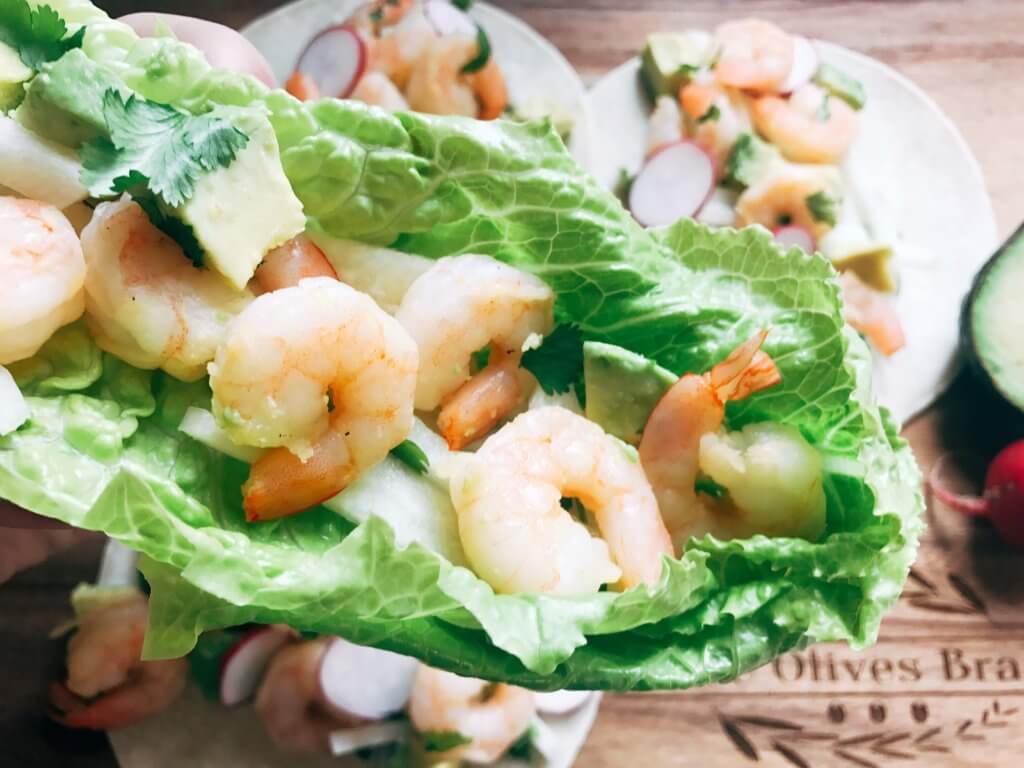 Less than 30 minutes for these simple and fresh shrimp tacos. Perfect for on-the-go food, full of bright and fresh flavors. Shrimp, orange, grapefruit, avocado, and jicama inspired by Aquafina Sparkling Water. A great twist on a seafood taco for Mexican night. Quick and easy to make, perfect for summer. Grapefruit Orange Shrimp Tacos with Jicama Slaw | Three Olives Branch | www.threeolivesbranch.com