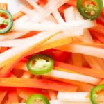 Pin of Spicy Vietnamese Pickled Vegetables up close with title at top
