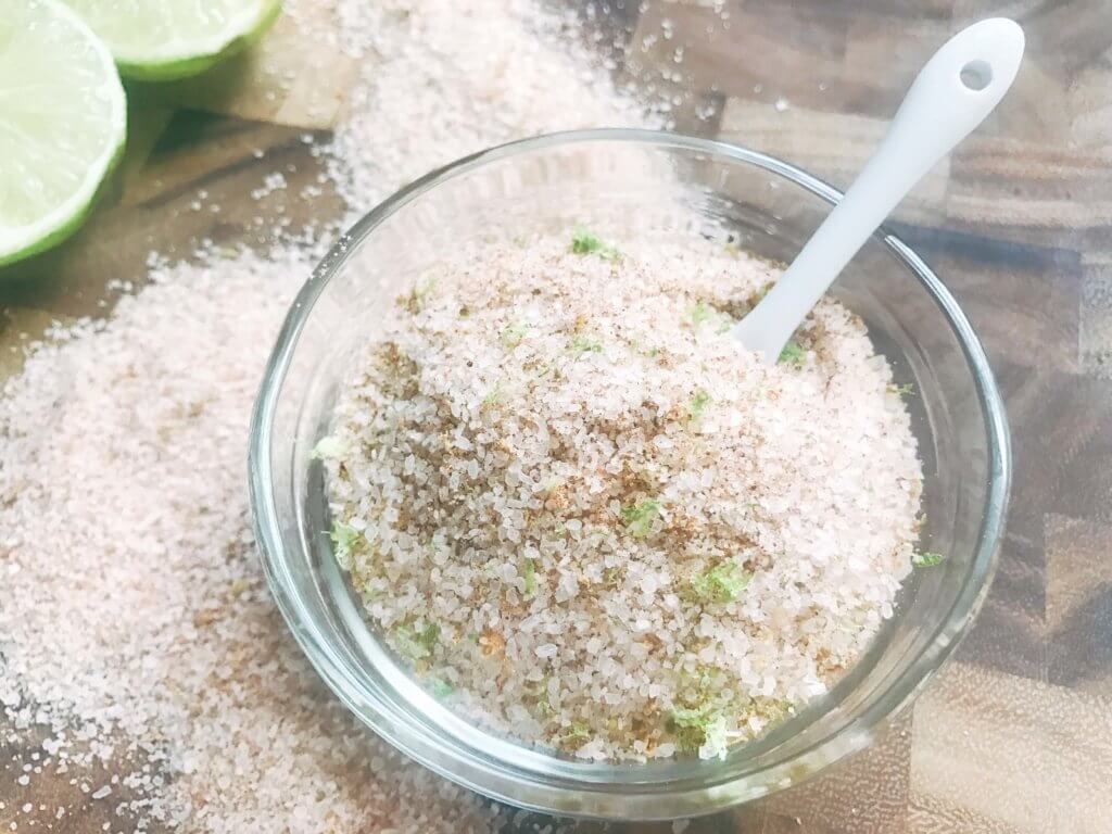 A quick and simple salt to make in just minutes. Perfect for grilling and the BBQ in the summer or as a gift for Father's Day. Works great on steak, beef, chicken, pork, and vegetables. Use it as something special for events and parties like the 4th of July. Easy to make in a food processor, vegan, vegetarian. Chipotle Lime Flavored Salt | Three Olives Branch | www.threeolivesbranch.com