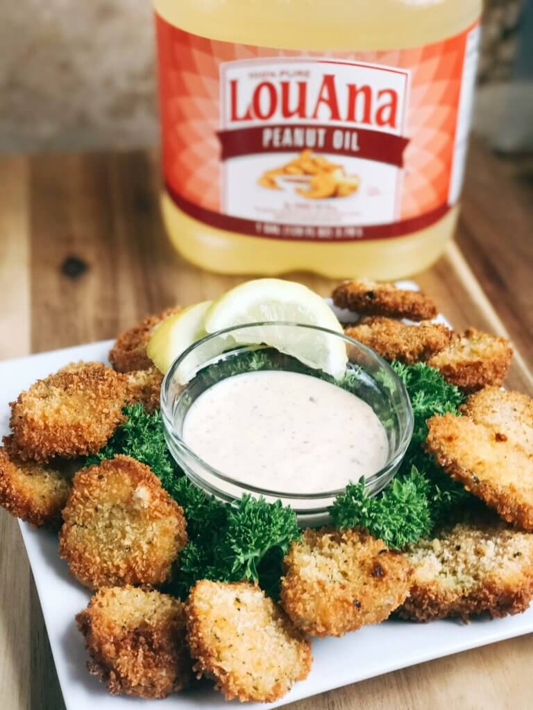 Smoky and slightly spicy fried pickles take on a new life! Tangy ranch flavors are combined with chipotle chile powder for a twist on a classic county fair dish. A crispy breadcrumb coating make these fried pickles perfect for an appetizer or snack, whether for the big game day, a party, BBQ, or summer grill event. Smoky Chipotle Ranch Fried Pickles | Three Olives Branch | www.threeolivesbranch.com