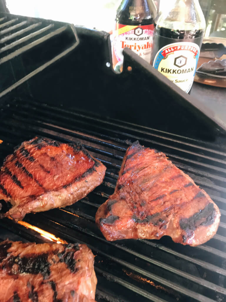 A quick and simple marinade that takes just a few minutes to put together. Perfect to leave overnight. The pineapple juice acid tenderizes the meat in a flavorful steak marinade. Great for any summer grilling, cook out, or BBQ event like 4th of July. Soy sauce, pineapple juice, ginger, and lime. Fast and easy dinner idea. Pineapple Soy Steaks | Three Olives Branch | www.threeolivesbranch.com