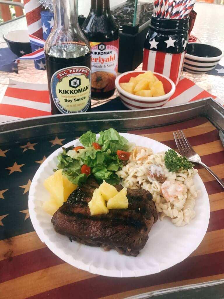 A quick and simple marinade that takes just a few minutes to put together. Perfect to leave overnight. The pineapple juice acid tenderizes the meat in a flavorful steak marinade. Great for any summer grilling, cook out, or BBQ event like 4th of July. Soy sauce, pineapple juice, ginger, and lime. Fast and easy dinner idea. Pineapple Soy Steaks | Three Olives Branch | www.threeolivesbranch.com