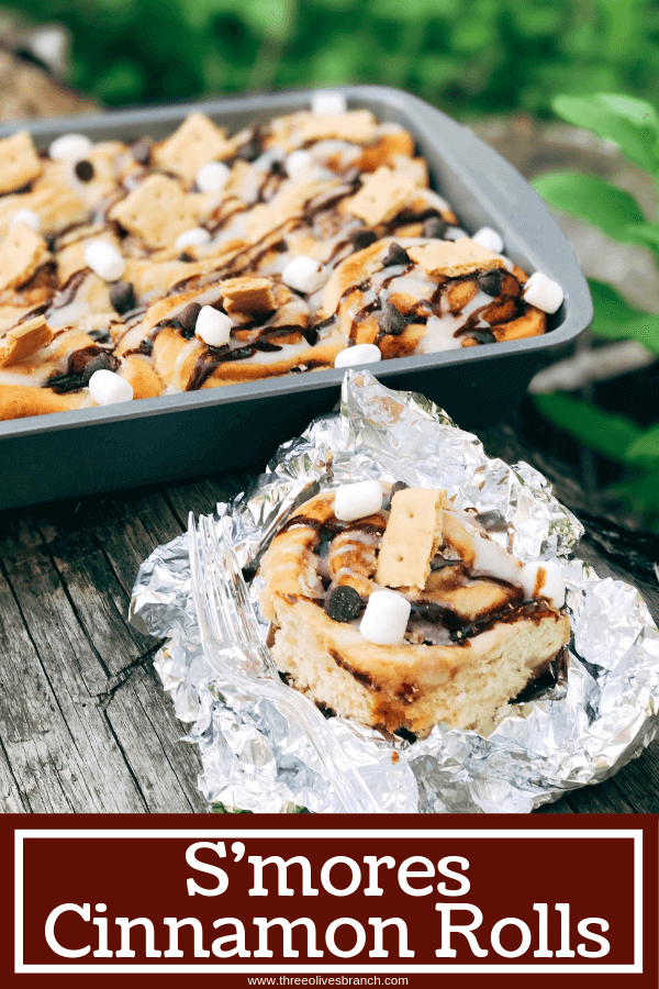 Great for camping and enjoying summer flavors, these rolls are filled with marshmallow fluff, chocolate, and graham crackers. Hold over great for camping trips or cookout parties. Kid friendly and a great way to celebrate summer whether a holiday like 4th of July or a BBQ cookout. S'mores Cinnamon Rolls #smores #campingrecipes #summerrecipes