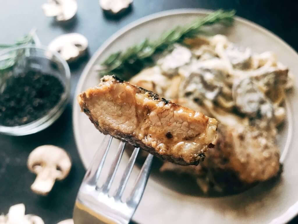 25 minutes to makes these marinated pork medallions and creamy mushroom pasta. Smithfield Roasted Garlic and Cracked Peppercorn Tenderloin Marinated Pork is a quick and easy meal solution for busy families any night of the week. The pasta is made from cream, mushrooms, garlic, and cracked black pepper. Fast, simple, and easy comfort food. Pork Medallions with Creamy Peppercorn Mushroom Pasta | Three Olives Branch | www.threeolivesbranch.com