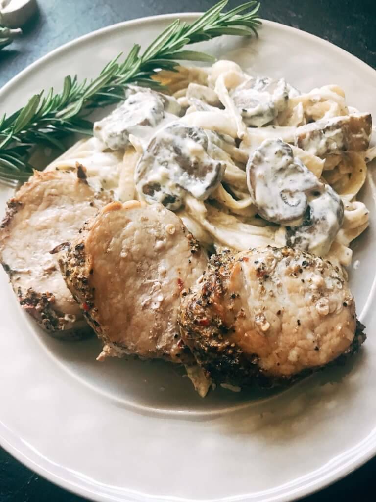 25 minutes to makes these marinated pork medallions and creamy mushroom pasta. Smithfield Roasted Garlic and Cracked Peppercorn Tenderloin Marinated Pork is a quick and easy meal solution for busy families any night of the week. The pasta is made from cream, mushrooms, garlic, and cracked black pepper. Fast, simple, and easy comfort food. Pork Medallions with Creamy Peppercorn Mushroom Pasta | Three Olives Branch | www.threeolivesbranch.com