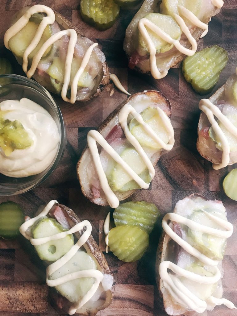 25 minutes for potato skins filled with Swiss cheese, leftover ham, pickles, and a mustard sauce. Gluten free and a perfect party appetizer or Super Bowl game day snack. Cubano Potato Skins | Three Olives Branch | www.threeolivesbranch.com #potatoskins #gamedayrecipe #leftoverham #cubano