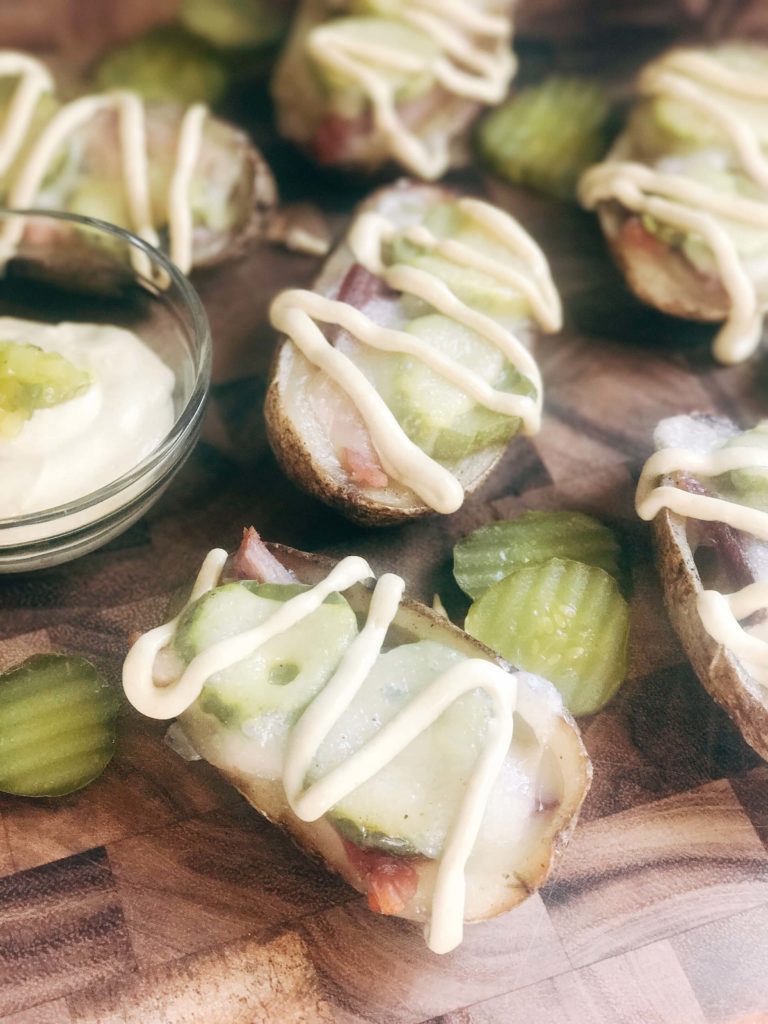 25 minutes for potato skins filled with Swiss cheese, leftover ham, pickles, and a mustard sauce. Gluten free and a perfect party appetizer or Super Bowl game day snack. Cubano Potato Skins | Three Olives Branch | www.threeolivesbranch.com #potatoskins #gamedayrecipe #leftoverham #cubano