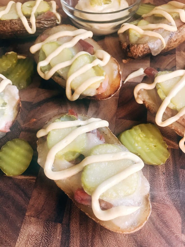 25 minutes for potato skins filled with Swiss cheese, leftover ham, pickles, and a mustard sauce. Gluten free and a perfect party appetizer or Super Bowl game day snack. Cubano Potato Skins | Three Olives Branch | www.threeolivesbranch.com #potatoskins #gamedayrecipe #leftoverham #cubano