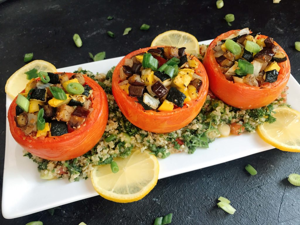 Eggplant, zucchini, and yellow squash stuffed in tomatoes for a twist on classic ratatouille. A healthy recipe that is vegan, vegetarian, low carb keto, gluten free (gf), whole 30, and paleo. Vegan Quinoa Tabbouleh | Three Olives Branch | www.threeolivesbranch.com #vegan #healthyrecipe