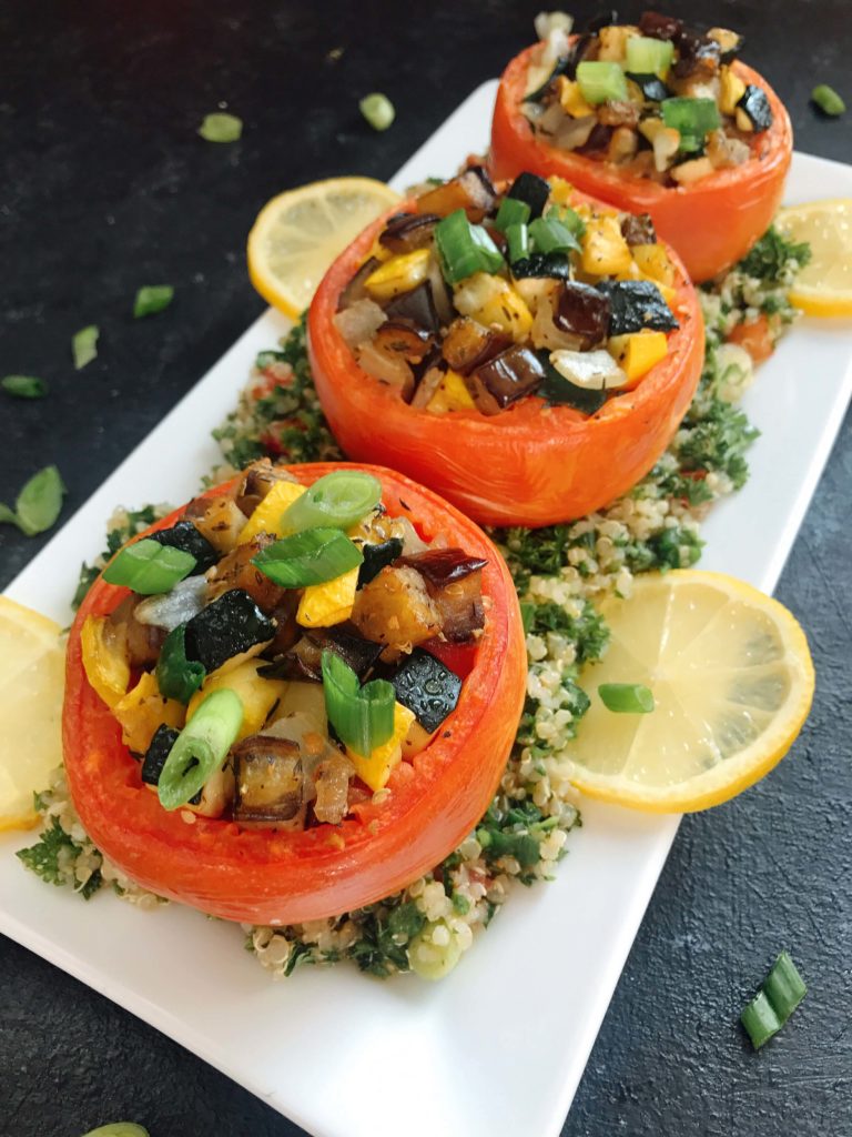 Eggplant, zucchini, and yellow squash stuffed in tomatoes for a twist on classic ratatouille. A healthy recipe that is vegan, vegetarian, low carb keto, gluten free (gf), whole 30, and paleo. Vegan Quinoa Tabbouleh | Three Olives Branch | www.threeolivesbranch.com #vegan #healthyrecipe