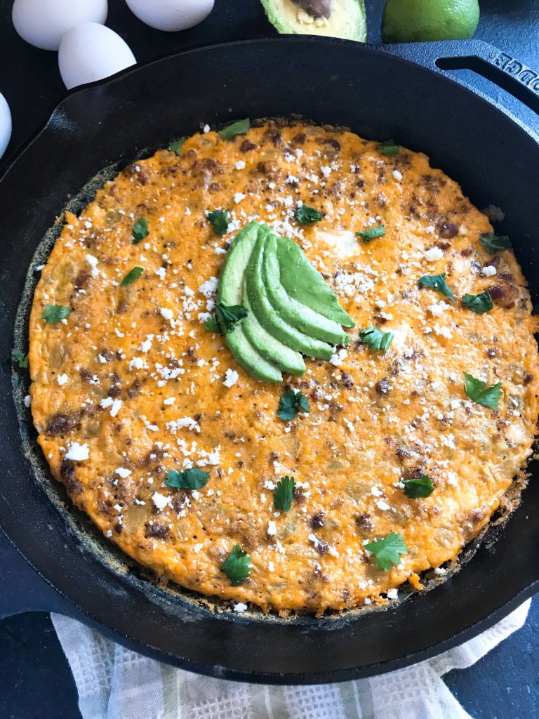 A quick and simple brunch or breakfast recipe, this low carb keto and gluten free frittata is ready in just 20 minutes! Spicy chorizo sausage, diced green chiles, and cotija cheese are combined with eggs for a simple breakfast. Chorizo and Green Chile Frittata #frittata #mexicanrecipe #breakfast