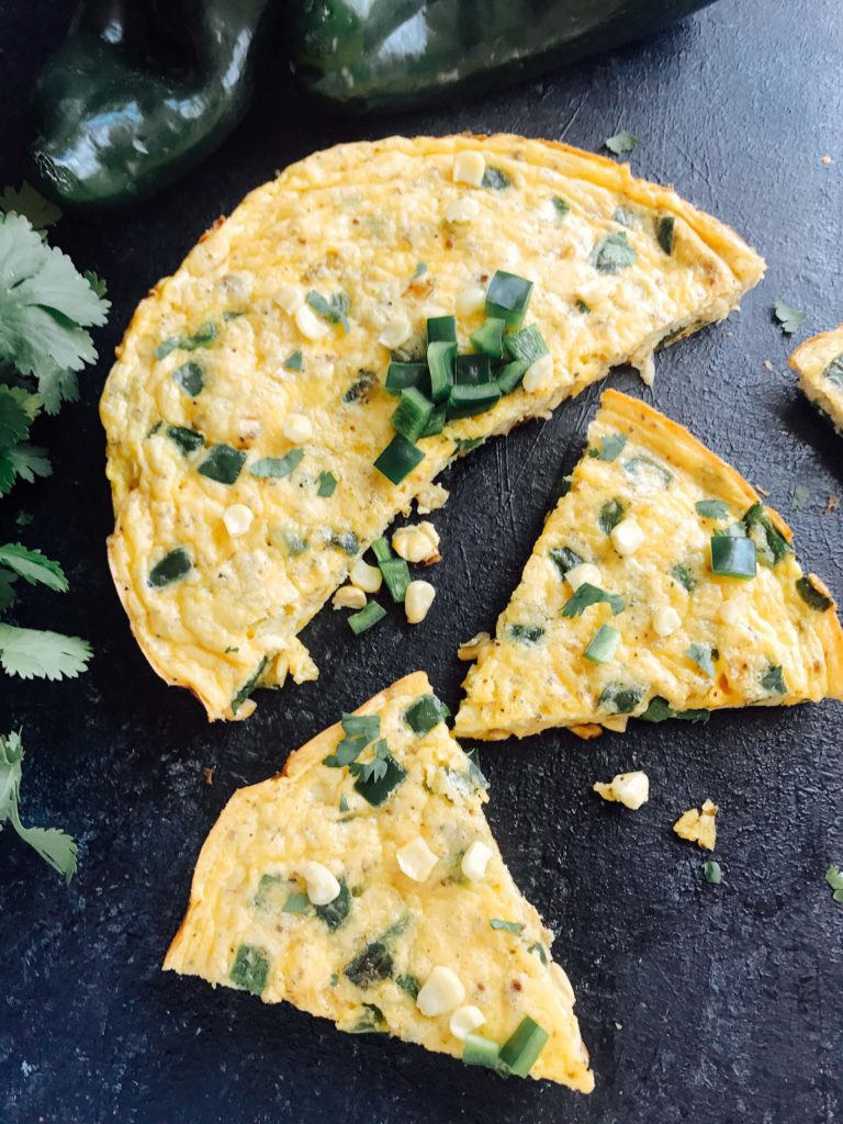 A quick and simple breakfast recipe, this frittata is full of poblano pepper and corn. Vegetarian and gluten free (GF). Easy brunch for a crowd with Mexican flavors. Poblano, Corn, and Cheddar Frittata | Three Olives Branch | www.threeolivesbranch.com #mexicanbreakfast #mexicanbrunch #easybreakfast #fastbreakfast #glutenfree