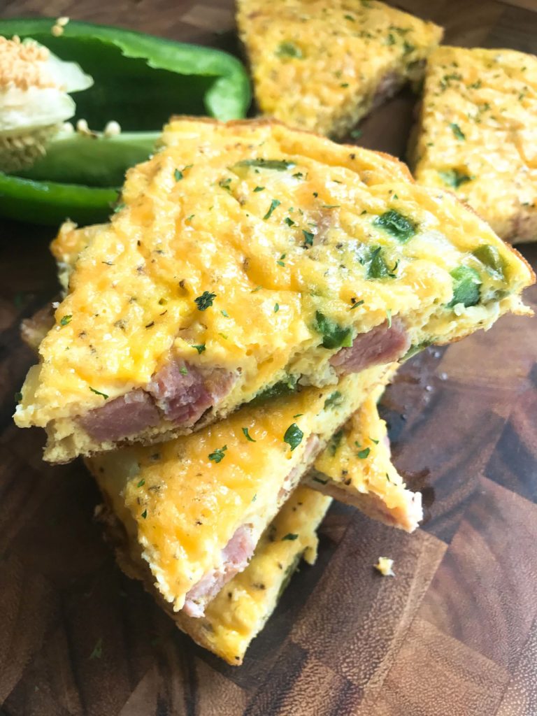 Quick and simple breakfast or brunch recipe, ready in less than 30 minutes. Ham, green bell pepper, onion, and cheddar highlight this twist on a Denver Omelette. Perfect to use up leftover ham from Easter, Christmas, or the holidays. Gluten free (gf). Denver Frittata | Three Olives Branch | www.threeolivesbranch.com