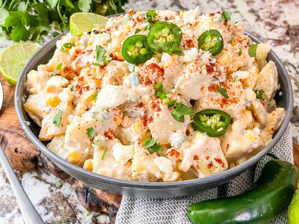A bowl of Mexican Street Corn Potato Salad ready to be served
