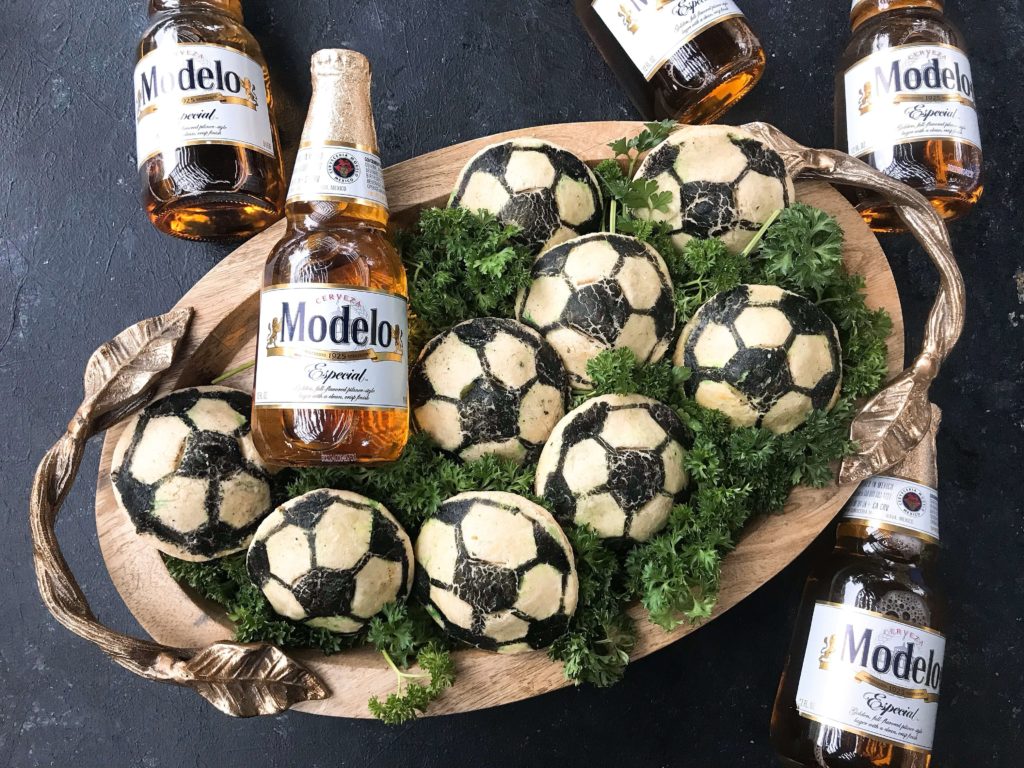 Soccer ball empanadas recipe perfect for the World Cup! Roasted poblano peppers, cheese, and Modelo marinated chicken are stuffed inside these Mexican empanadas. Msg 4 21+ Soccer Ball Chicken Chile Relleno Empanadas | Three Olives Branch | www.threeolivesbranch.com #CelebratorySips #ModeloSummer #ad #SoFabFood 