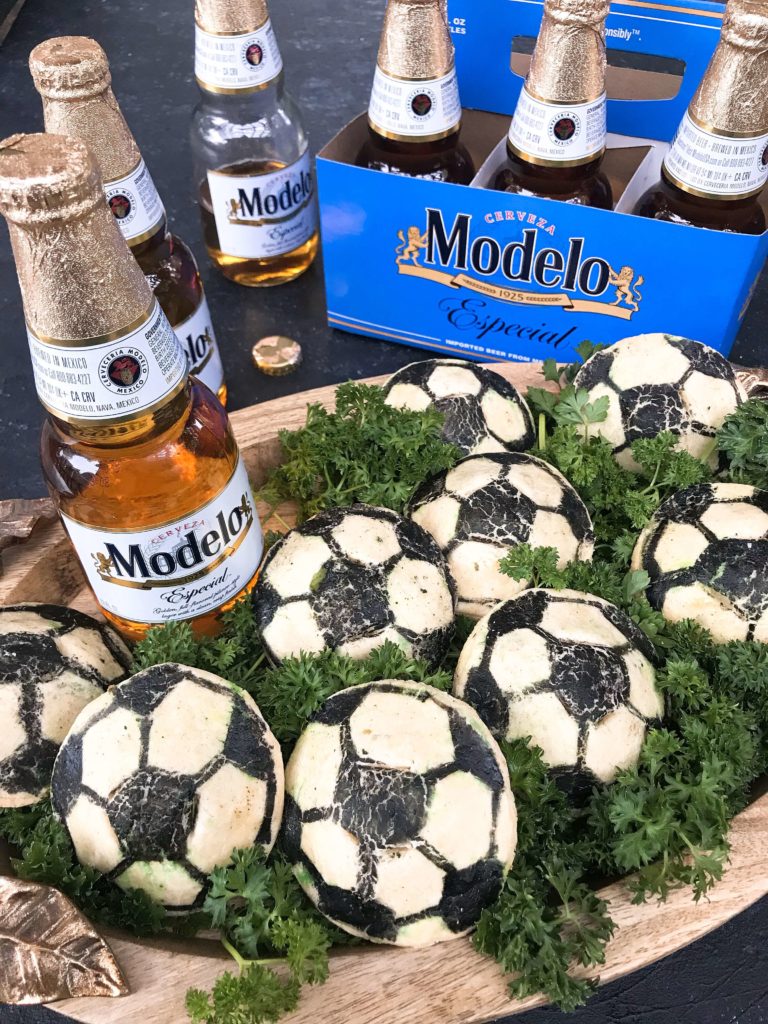 Soccer ball empanadas recipe perfect for the World Cup! Roasted poblano peppers, cheese, and Modelo marinated chicken are stuffed inside these Mexican empanadas. Msg 4 21+ Soccer Ball Chicken Chile Relleno Empanadas | Three Olives Branch | www.threeolivesbranch.com #CelebratorySips #ModeloSummer #ad #SoFabFood 