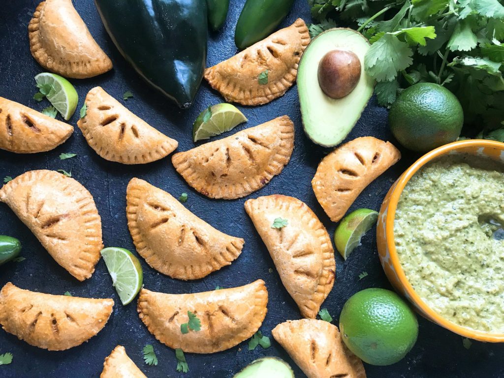 Empanadas stuffed with shredded beef and a Mexican Street Corn Salsa (elote) recipe of corn, cotija cheese, jalapeno, lime, chili powder, cilantro, and salt. A fun Mexican appetizer or snack. Use pie crust or make your own dough and leftover beef or steak if desired. Shredded Beef and Mexican Street Corn Empanadas | Three Olives Branch | www.threeolivesbranch.com #cincodemayo #fiesta