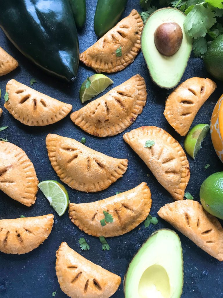 Empanadas stuffed with shredded beef and a Mexican Street Corn Salsa (elote) recipe of corn, cotija cheese, jalapeno, lime, chili powder, cilantro, and salt. A fun Mexican appetizer or snack. Use pie crust or make your own dough and leftover beef or steak if desired. Shredded Beef and Mexican Street Corn Empanadas | Three Olives Branch | www.threeolivesbranch.com #cincodemayo #fiesta