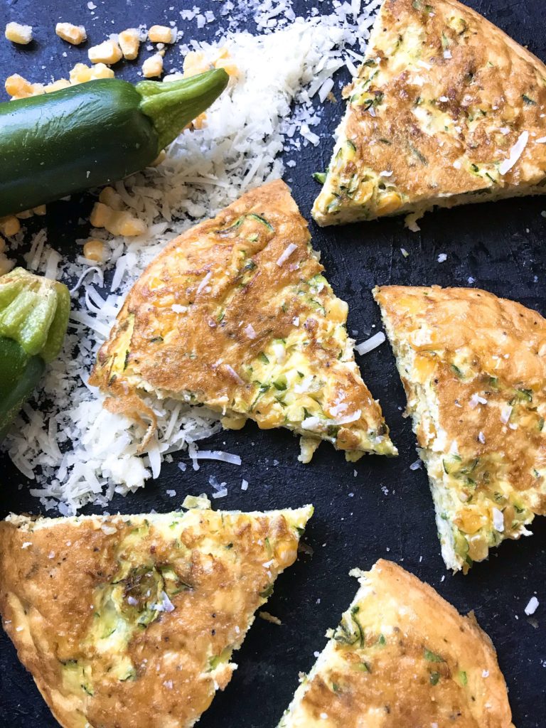 Ready in 20 minutes, this fast and simple breakfast or brunch recipe is full of zucchini, corn, and Parmesan cheese mixed with egg. Gluten free (GF) and vegetarian. Vegetarian Zucchini Corn Frittata | Three Olives Branch | www.threeolivesbranch.com