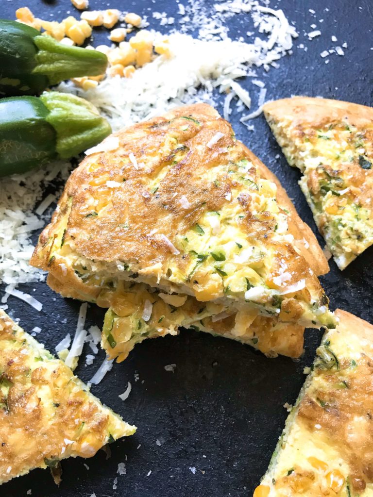 Ready in 20 minutes, this fast and simple breakfast or brunch recipe is full of zucchini, corn, and Parmesan cheese mixed with egg. Gluten free (GF) and vegetarian. Vegetarian Zucchini Corn Frittata | Three Olives Branch | www.threeolivesbranch.com