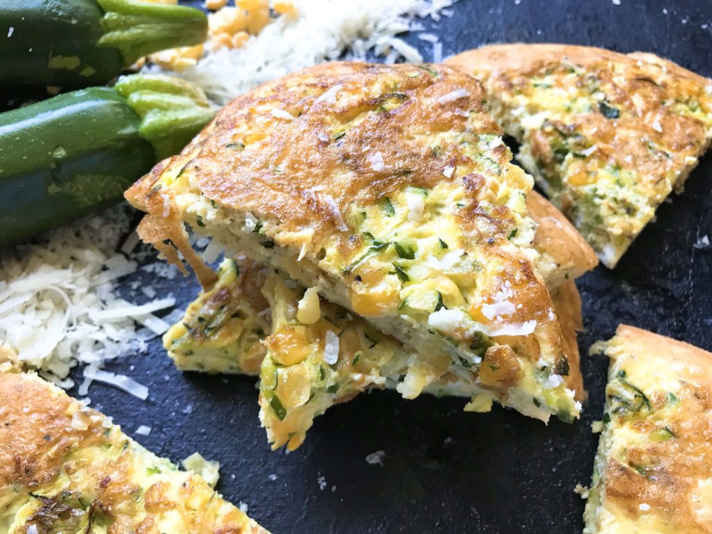 Ready in 20 minutes, this fast and simple breakfast or brunch recipe is full of zucchini, corn, and Parmesan cheese mixed with egg. Gluten free (GF) and vegetarian. Vegetarian Zucchini Corn Frittata | Three Olives Branch | www.threeolivesbranch.com